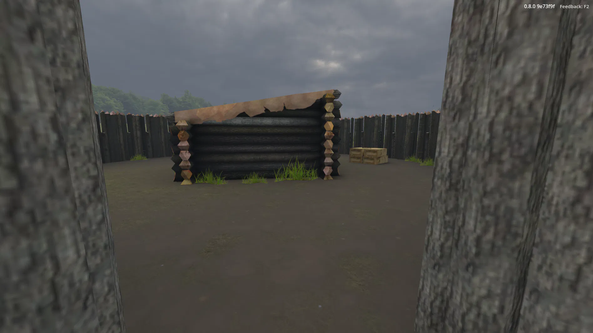 A view from the main entrance of the Fort Necessity stockade, looking in towards the log storehouse.